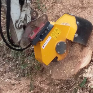 stump grinder destroying tree stump