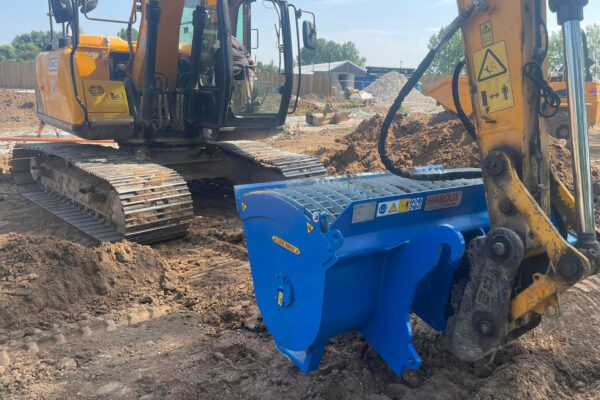 TS50 concrete mixing bucket on a JCB on site