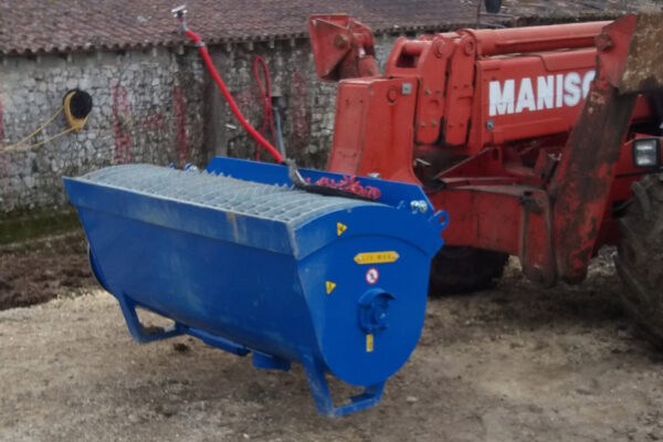 Concrete Mixing Bucket attached to a machine
