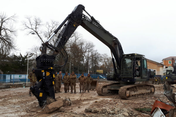 Trevi Benne Multi Function Pulveriser attached to an excavator on an army site