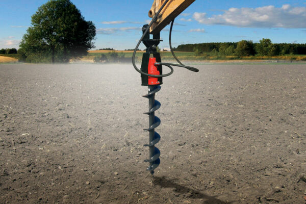 auger drill drilling into the ground