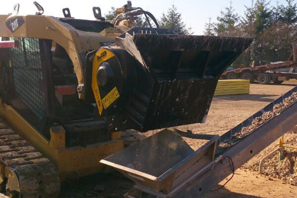 Cat skidsteer with MB attachment